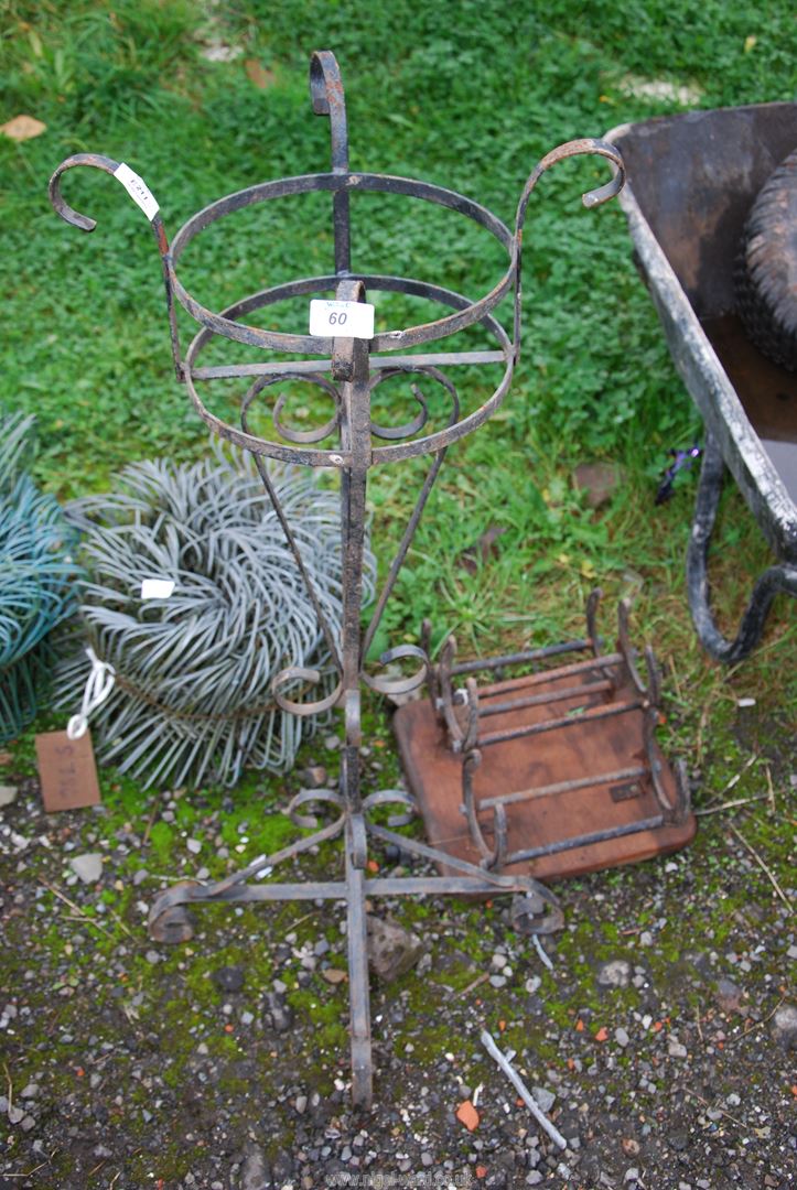 A pot stand and a boot scraper.