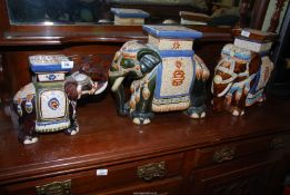 Three elephant stools.