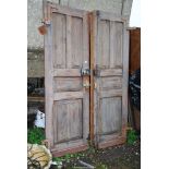 Two solid doors includes locks and keys - 25" x 78".