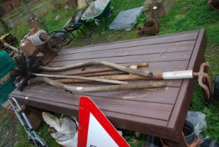 A sweep brush, hand cultivator, two Scythe handles etc.