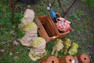 Three large concrete lions, Three smaller Lions, plus two terracotta pots, and two flamingo's.