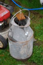 Am old galvanised milk churn - no lid.