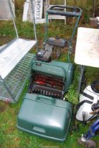 A 'Balmoral' petrol engined cylinder mower model 17 S.