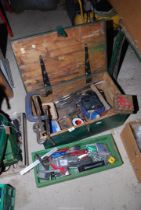 A variety of workshop equipment including chisel, G-clamp, copper hammer, etc.