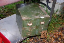 A four drawer stationary cabinet.