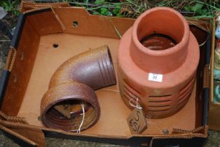 A terracotta Chimney Pot Cowl, and a 90° Salt Glazed Drainage elbow joint.