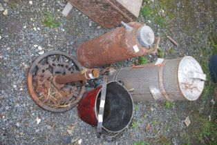 A vintage fire extinguisher, a galvanised red bucket, umbrella stand,