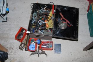 Metal box containing sockets circlip pliers, tin snips and soldering gun, etc.