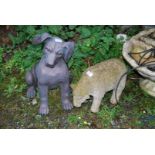 A fibreglass puppy and sheep.