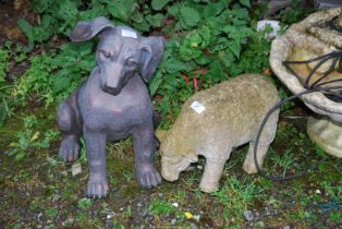A fibreglass puppy and sheep.