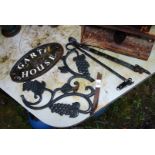 A house sign, window latches etc.