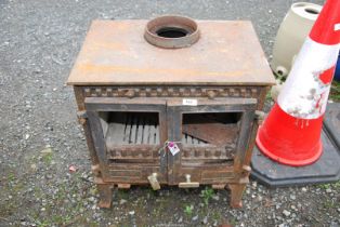 A multi purpose stove, 21 3/4'' deep x 14 3/4'' deep x 23 3/4'' high.