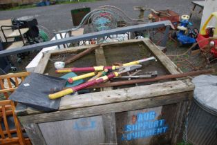 A snow shovel, two small G-clamps, plus a heavy duty cantilever lopper.