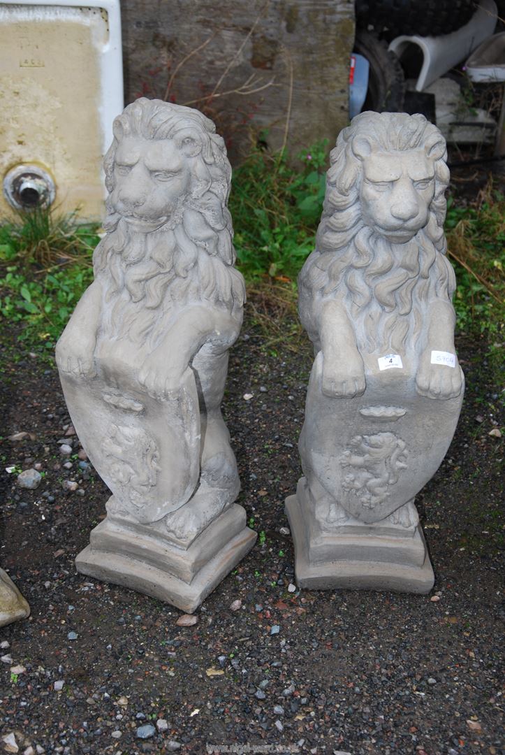 Pair of concrete Heraldic lions -31½" high.