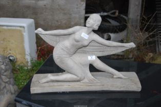 A concrete art Deco style female figure - 16½" high x 23" long x 7" deep.