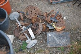 Heavy metal work - old rope pulley, cast wheels, swivel casters, old balance scales (no weights).