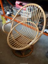 A Bamboo conservatory style egg chair.
