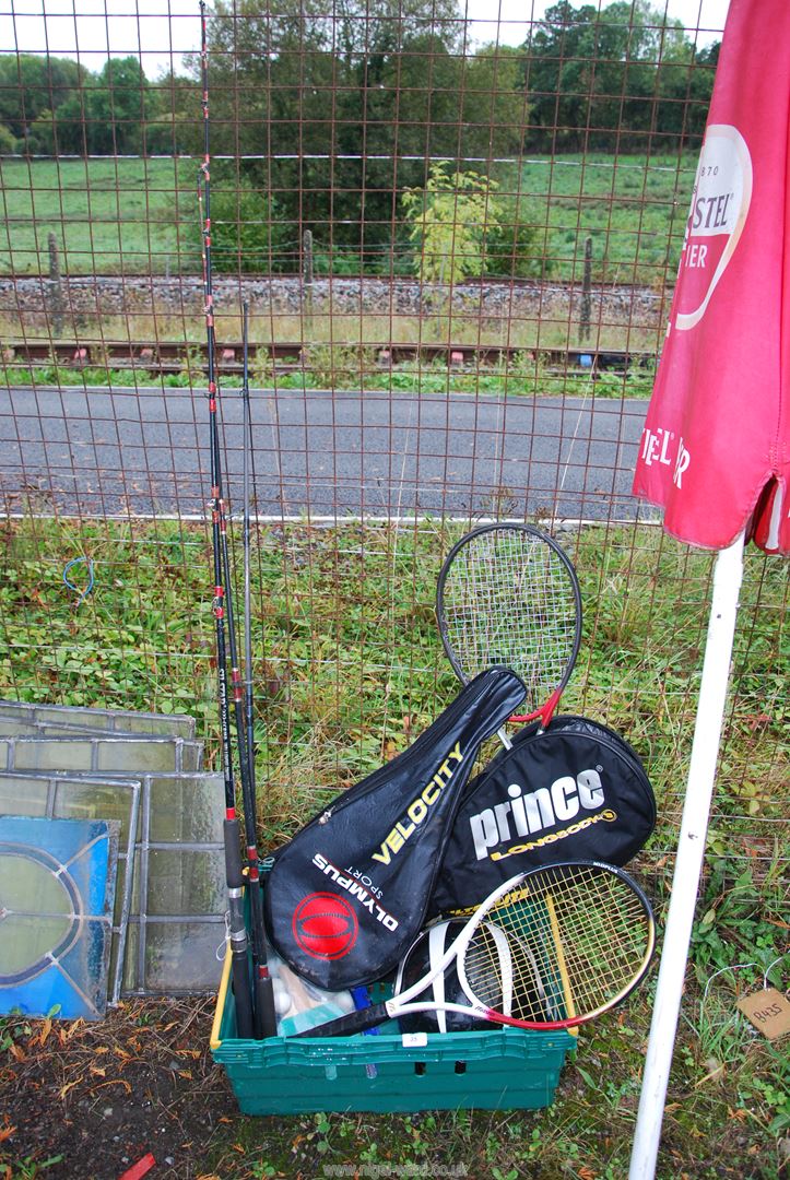 Fishing rods, tennis racquets, crash helmet, table tennis balls and bats.