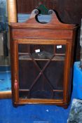 An old three cornered glass wall cabinet - 22½" wide x 36" high.