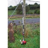 A Tondu long arm hedge trimmer for spares and repairs.