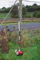 A Tondu long arm hedge trimmer for spares and repairs.