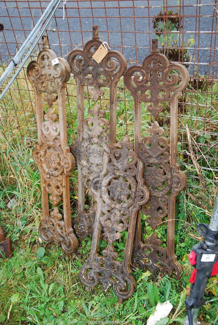 Three complete and one part Cast Iron ornate decorative Balusters, 95" high.