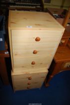 A pair of three drawer bedside chests.