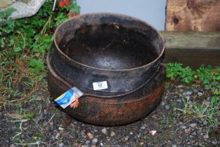 A cast iron cauldron - 12½" across x 10½" high.