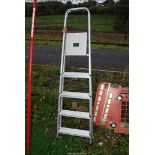 Five rung aluminum step ladder.