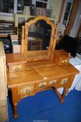 A dressing table with swing mirror - 39 1/2" x 18" x 3' high.