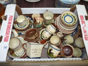 A box of Torquay ware including cups, saucers, plates, egg cups, etc.