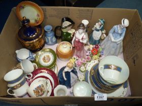 A quantity of china including: Limoges plates, Wade Toby jug, Welsh Crest figures, posies,