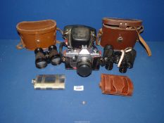 A pair of Lieberman & Gortz 15 x 42 cased binoculars,