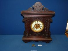 A Rosewood Mantle clock by the Ansonia Clock Co.