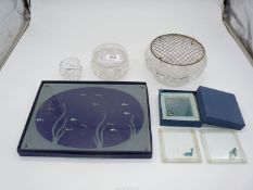 A small quantity of glass including crystal rose bowl, ocean related coasters and place mats,