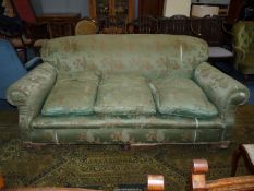 An elegant circa 1910 three-seater settee upholstered with chinoiserie style green ground satin