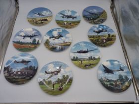 A quantity of Royal Doulton Heroes of the Sky wall plates.