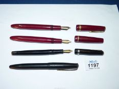 Four fountain pens including some with 14k gold nibs, all a/f.