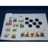 A small quantity of stamps and tokens of the 1998 England football squad and The Makers of the