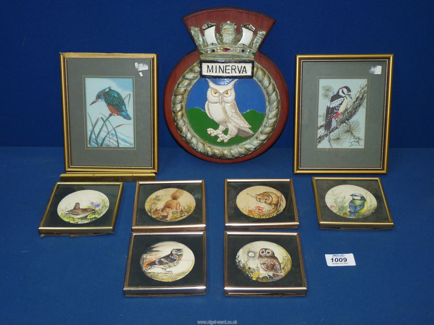 Two woven silk pictures and six watercolours depicting wild life, together with a Minerva plaque.