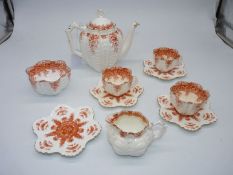 A Wileman Foley Shelley Daisy design part tea set including teapot, three teacups and four saucers,
