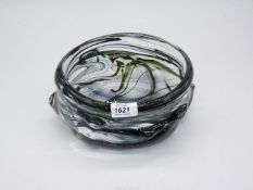 A Whitefriars knobbly dish in black swirl design, 8 1/2" diameter.