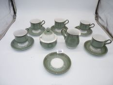 A green Denby part coffee set for six, no coffee pot.