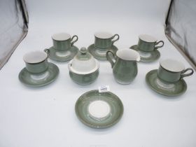 A green Denby part coffee set for six, no coffee pot.