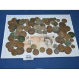 A quantity of English coins including a ten shilling note, including old pennies, half pennies,