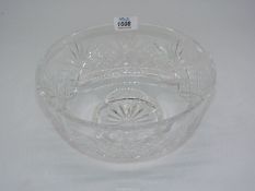 A heavy cut glass bowl.