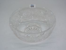 A heavy cut glass bowl.