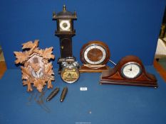 A quantity of clocks including miniature Grandfather clock, Haynes VW 1600 Transporter alarm clock,