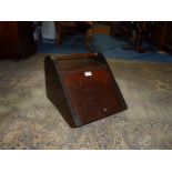 A dark-wood Coal box with lift up lid, with liner.