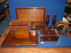 A quantity of treen including trays, boxes, desk letter box, pair of turned candlesticks, etc.
